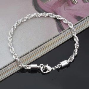 Women's Silver Tone Braided Twisted Bracelet 8"
